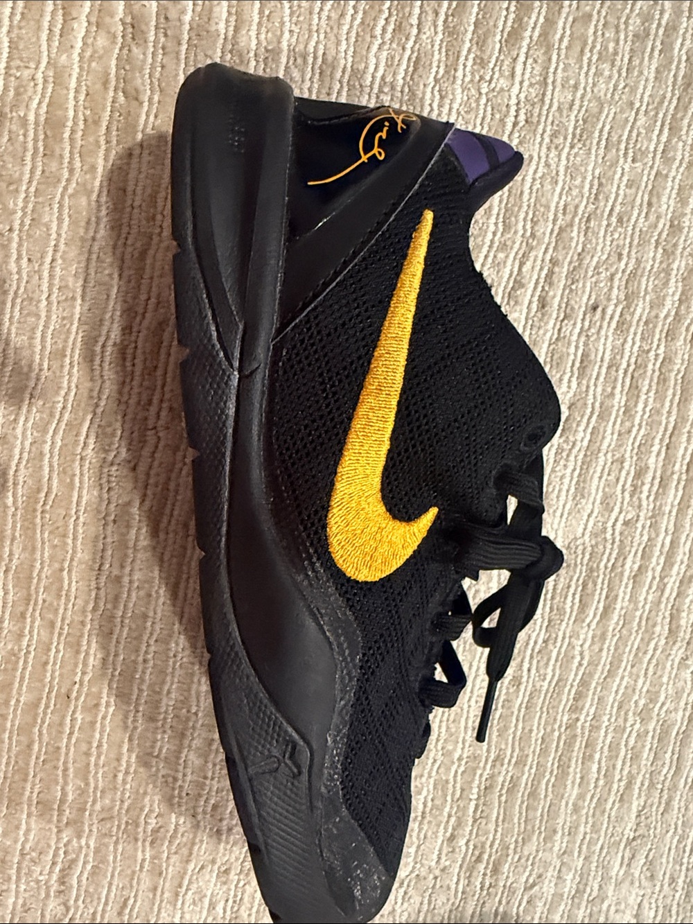 Nike Black and Gold Low-Top Sneakers